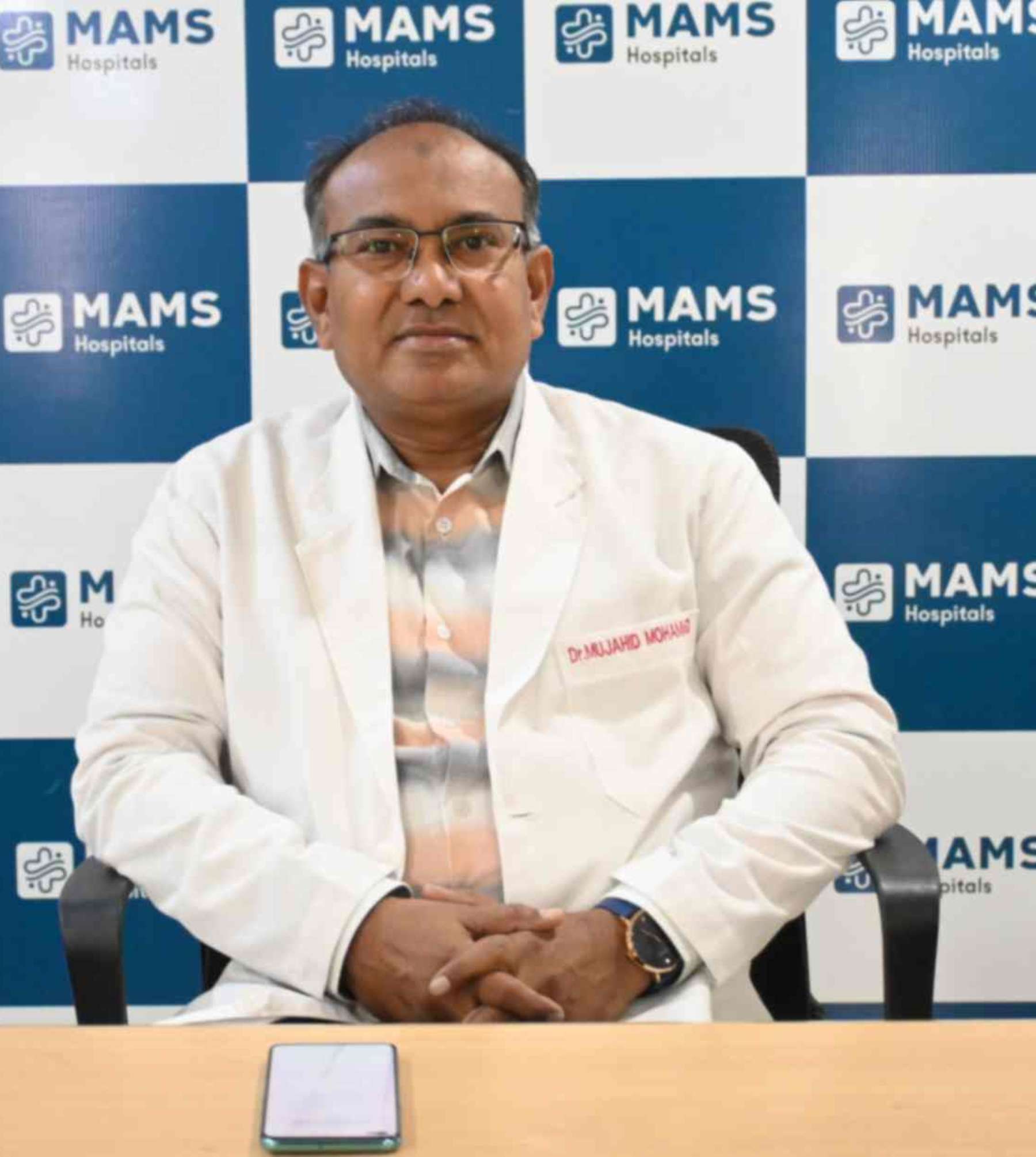 DR MUJAHID MOHAMMED